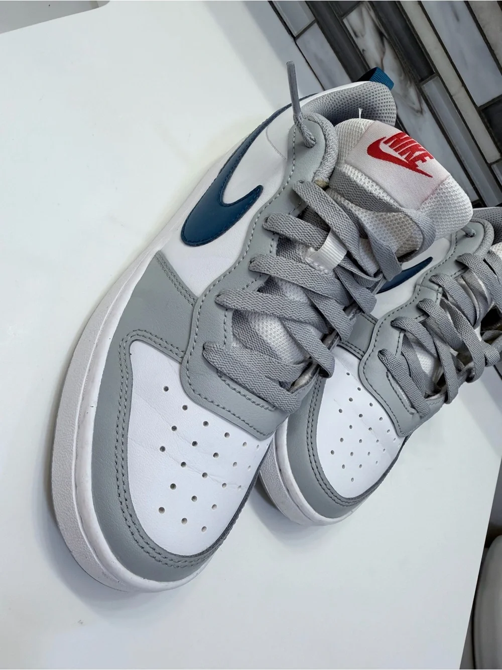 Nike Low-Top Sneakers in White, Gray, and Navy